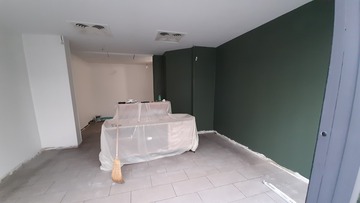 Rénovation d’une boutique à Nantes : pose de toile, mise en peinture et finitions express
